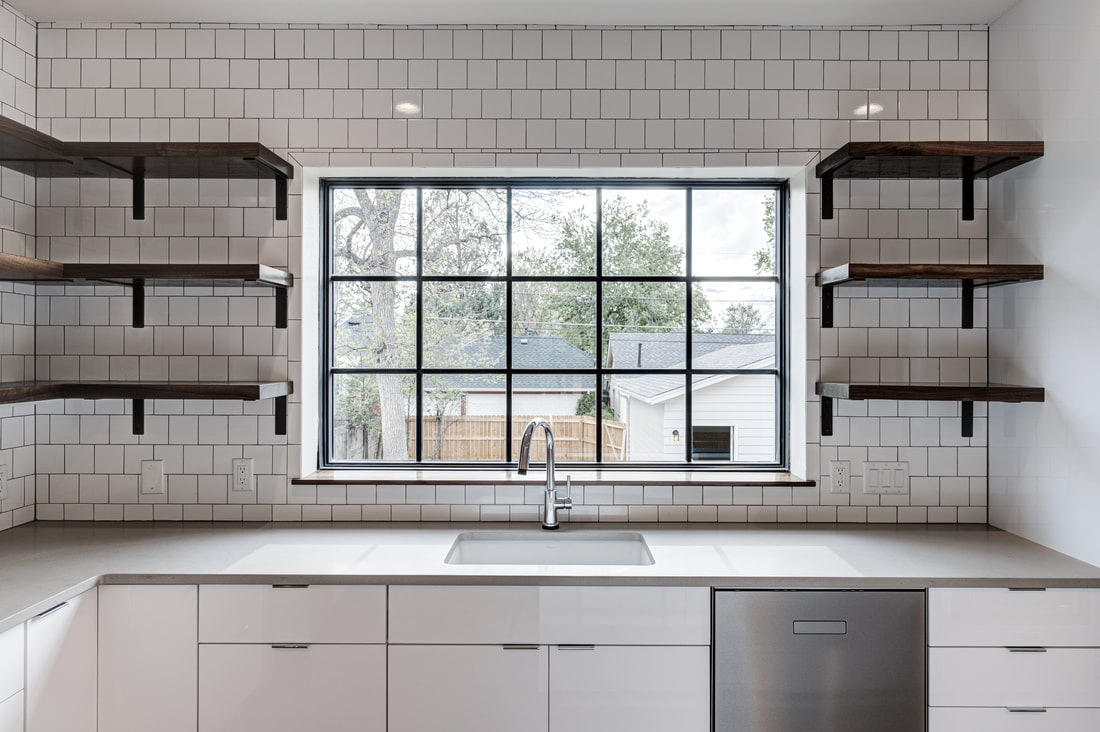 Custom shelving flanking a window